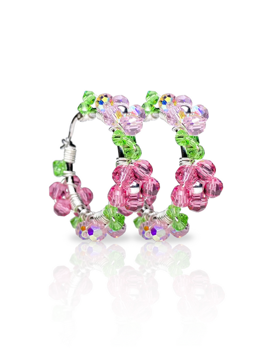 Vaaleanpunaiset kukkakorvakorut